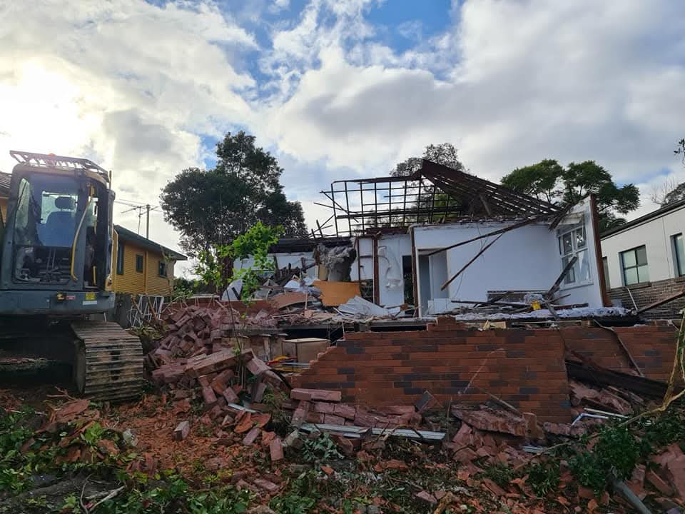 Brick house demolition with Volvo excavator